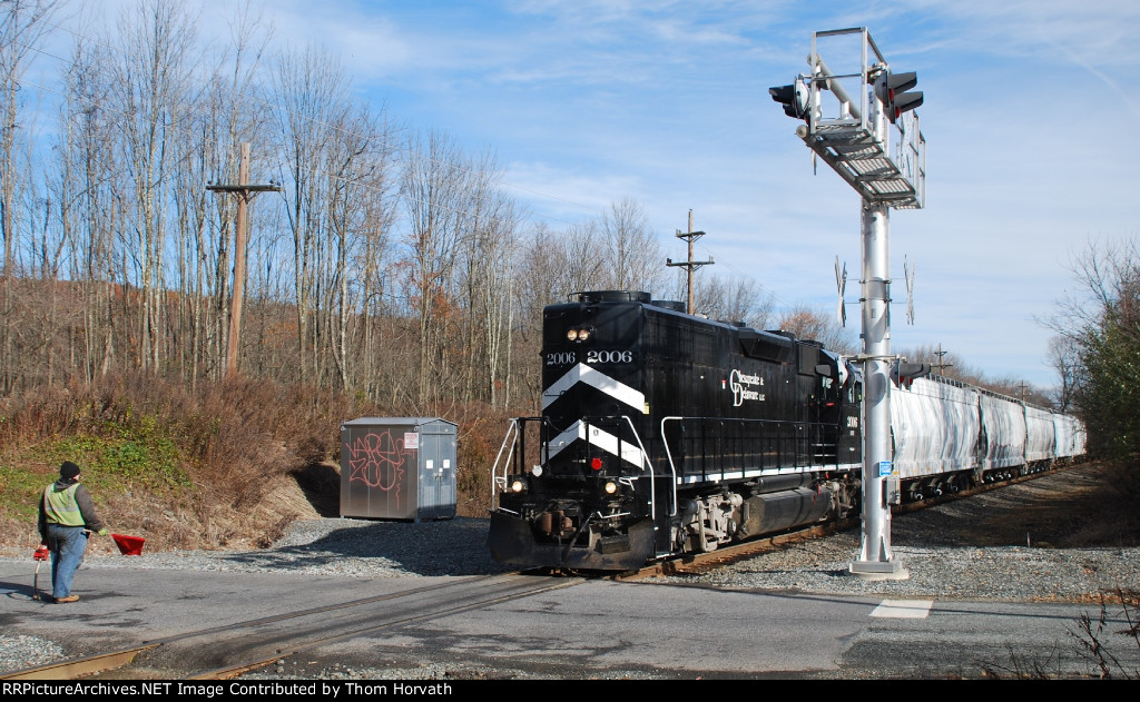 The conductor flags that Blau Road grade crossing